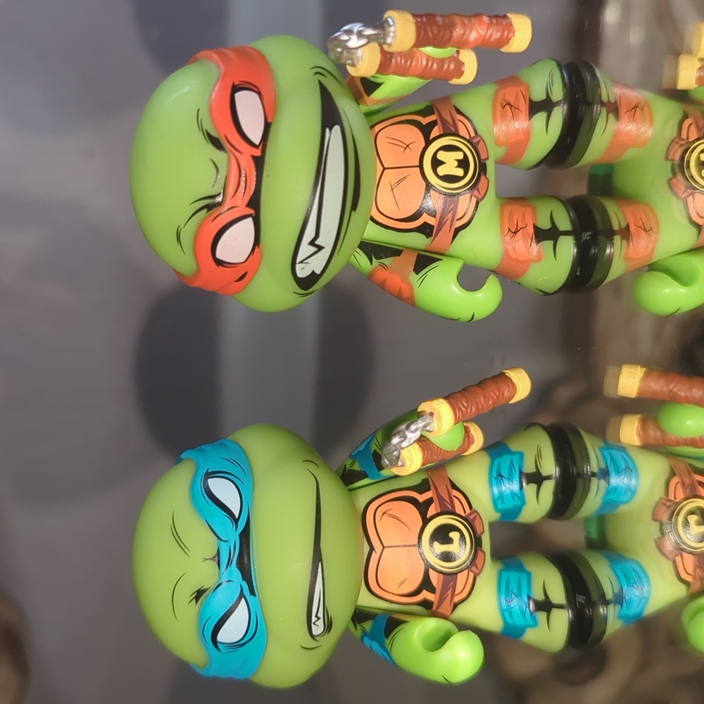 Kidrobot Teenage Mutant Ninja Turtles , Michaelangelo and Leonardo Figures